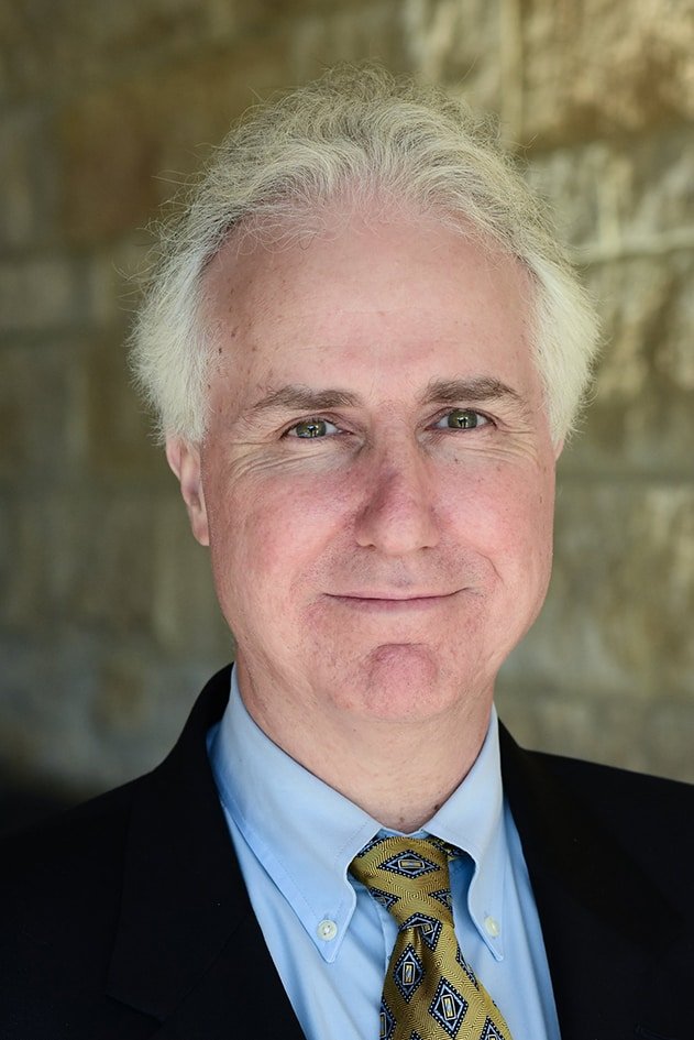 Headshot of Thomas Demaria, a psychologist.