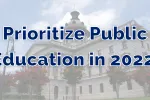 The text "Prioritize Public Education in 2022" lies over the South Carolina statehouse