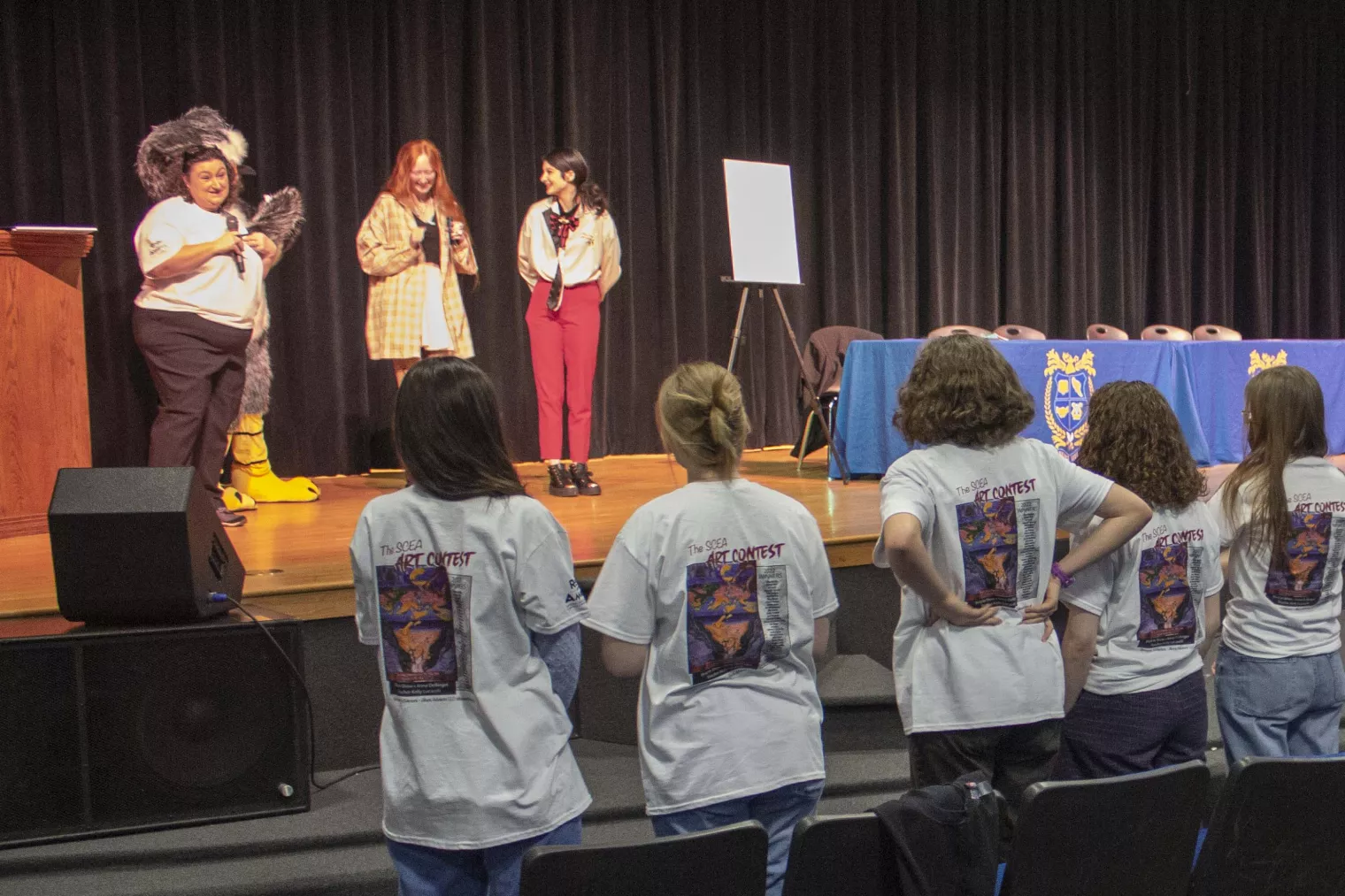 Students will T-Shirts of Winning Artwork