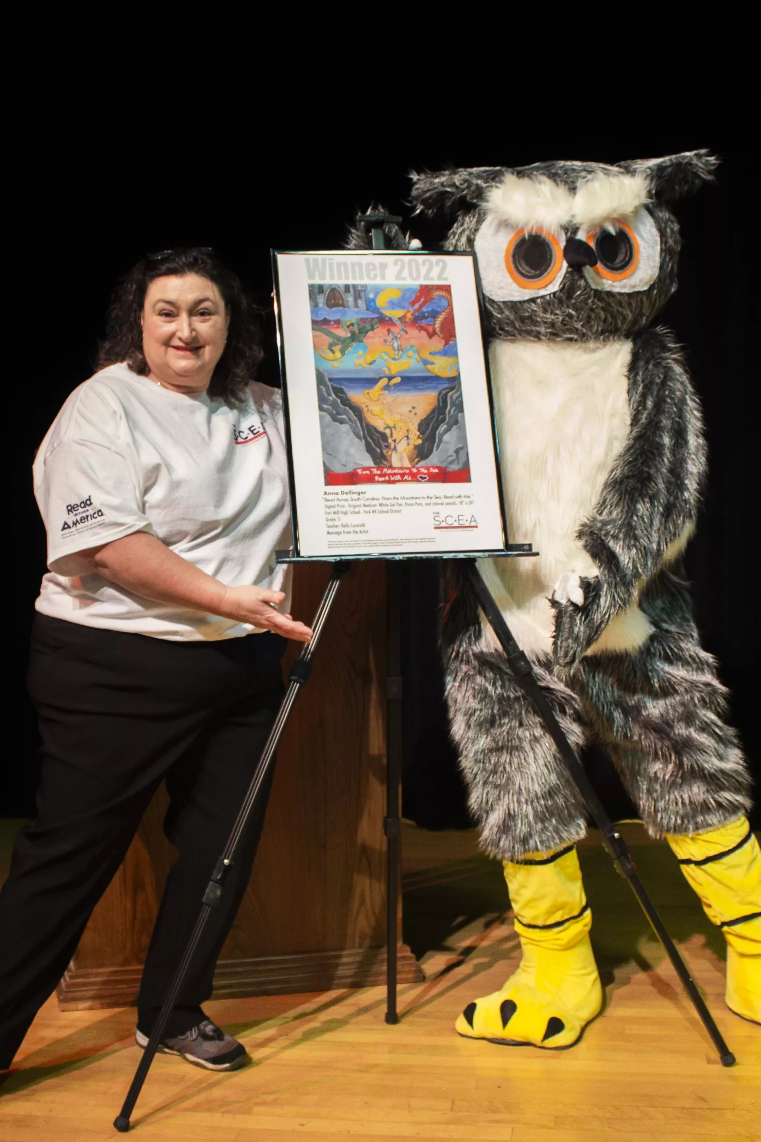 Sherry East and Ollie with winning artwork