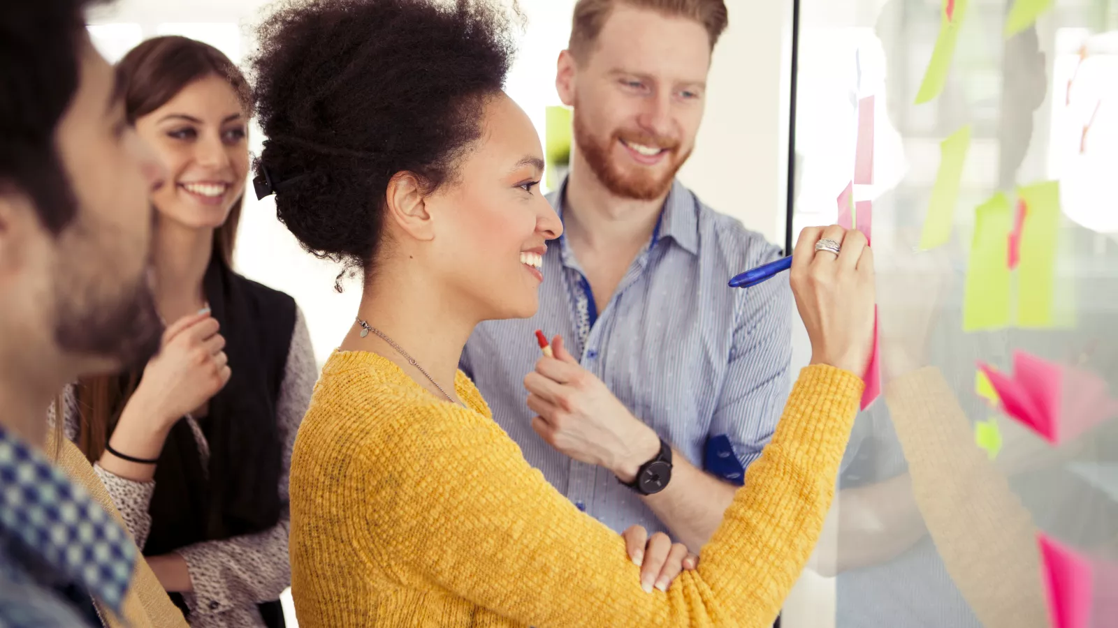 Educators work on a chart at a workshop