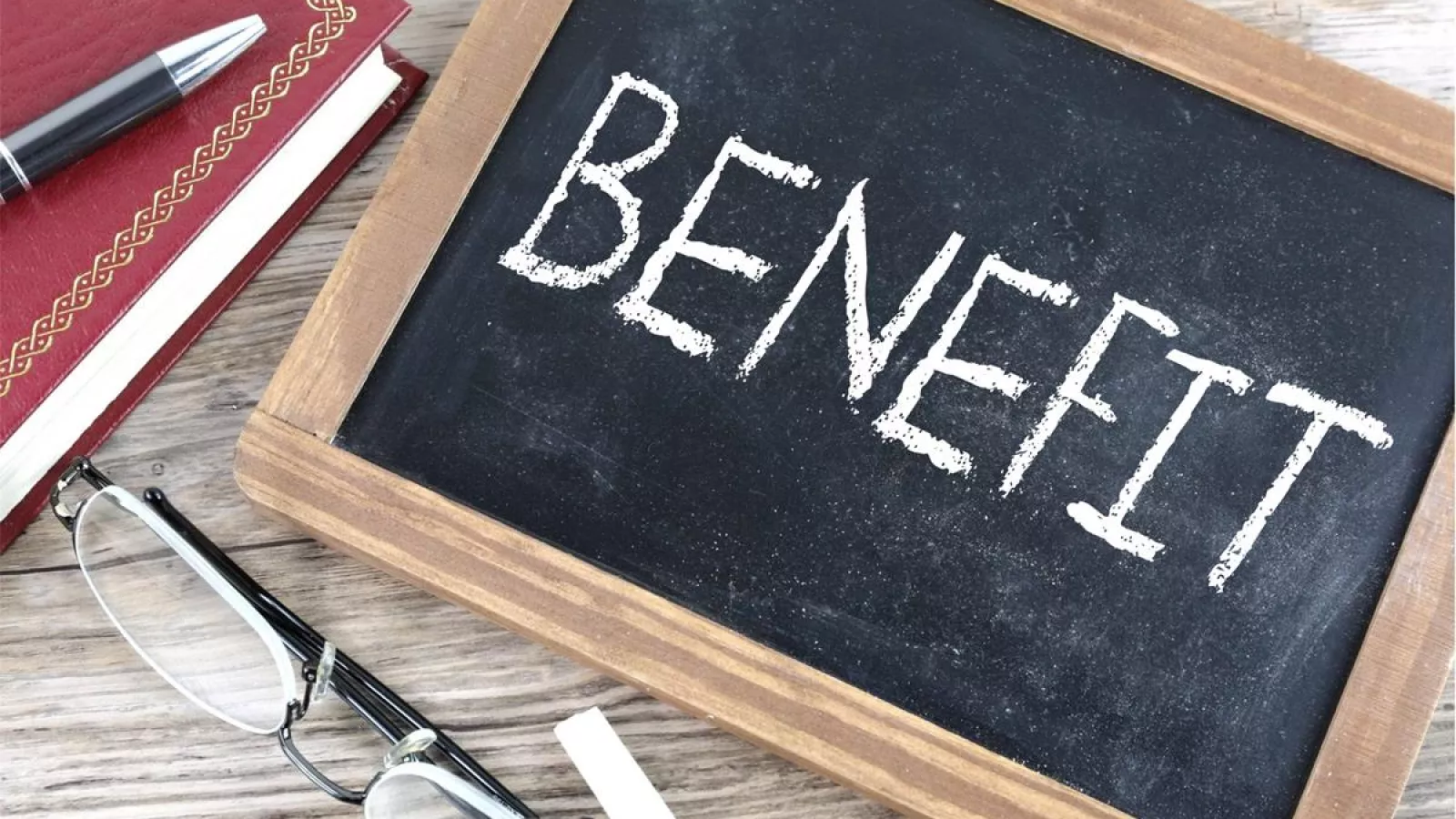 "Benefit" written in chalk