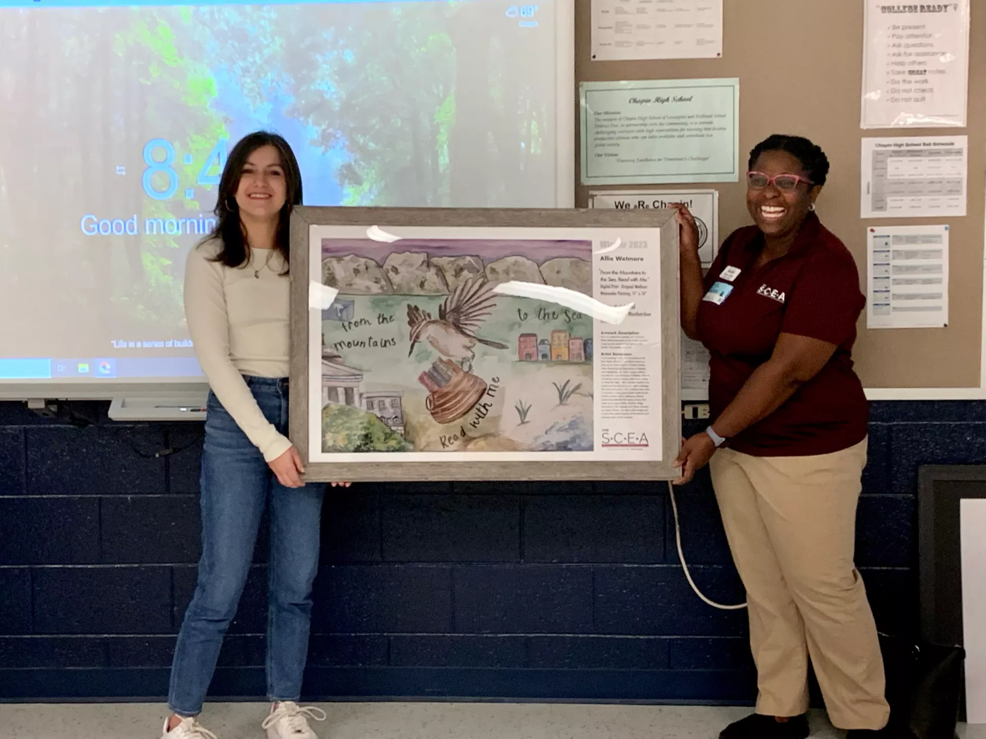 2023 Art Contest Winner Allie Wetmore with her winning artwork and her teacher.