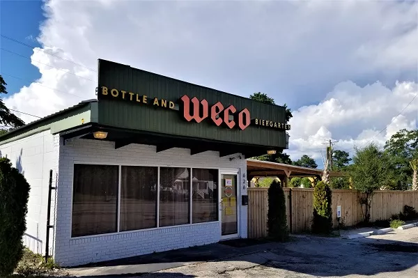 storefront of weco bottle shop and biergarten