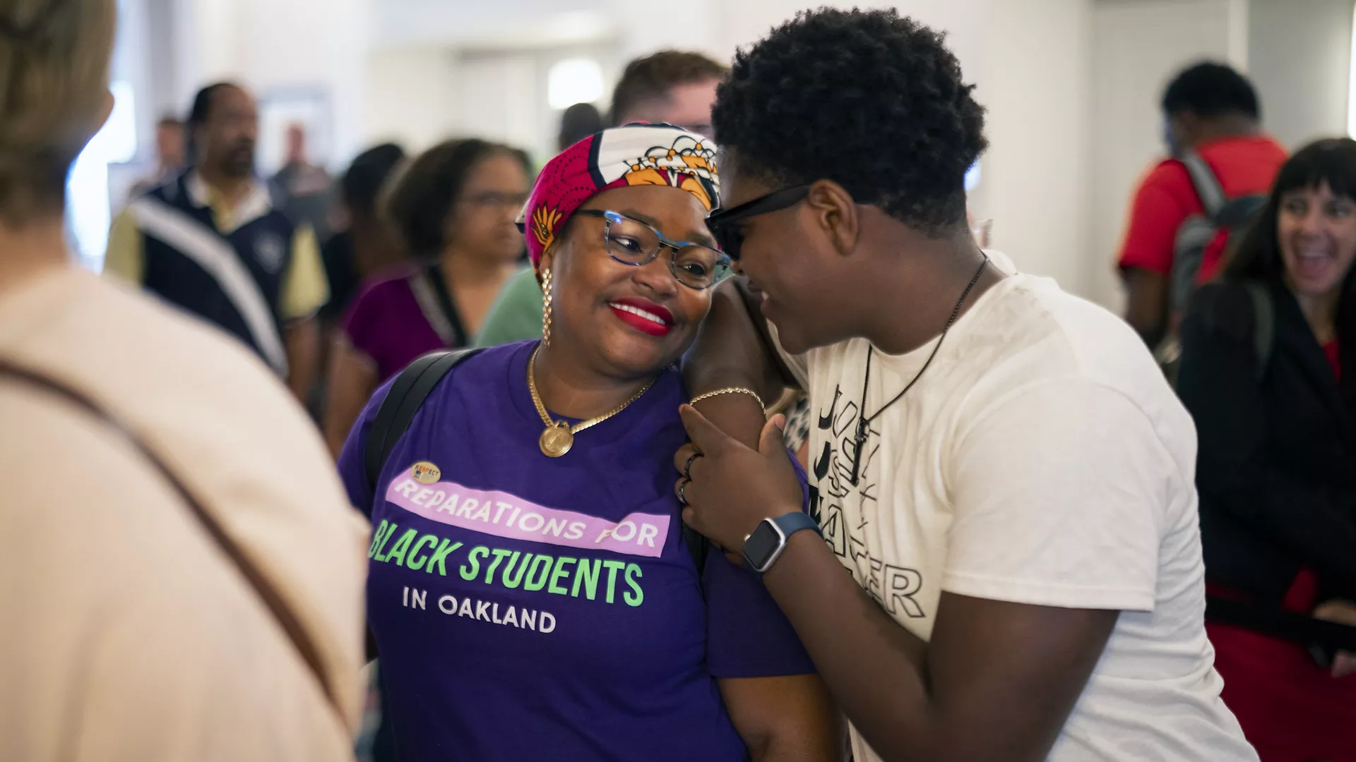 Attendees at the Conference on Racial and Social Justice greet each other in Orlando, Florida
