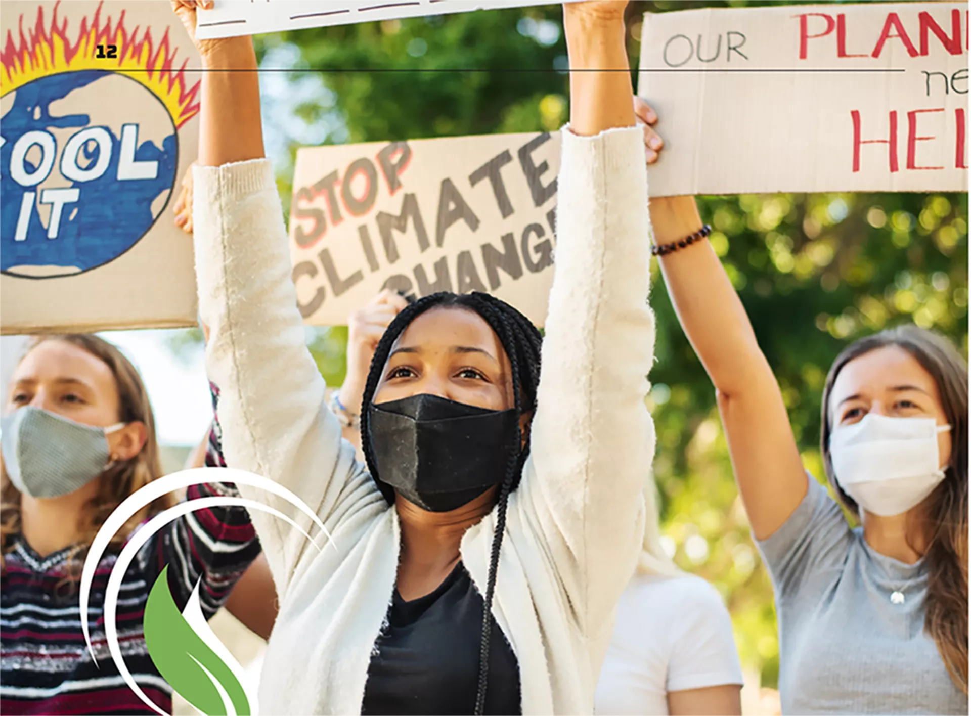 A group of people holding environmental justice signs.