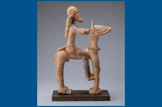 African American statue of a man riding a donkey