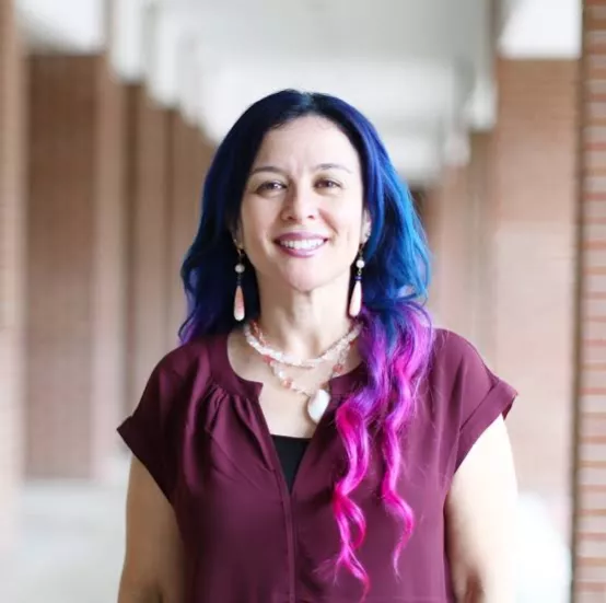A photo of UCF professor Yovanna Pineda, a Latina woman with long black hair