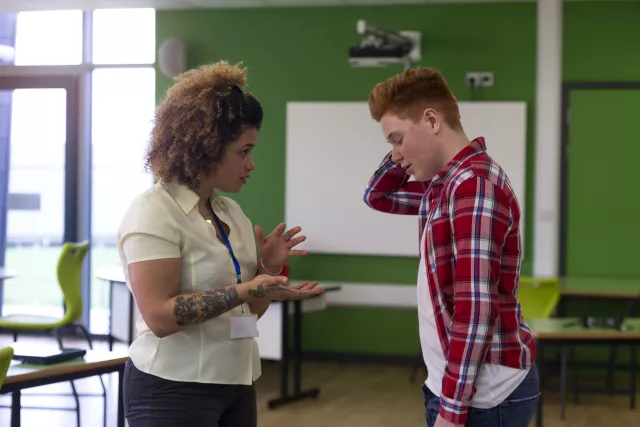 An ESP talks with a student one on one.