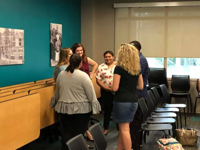 The Student SCEA members chat.