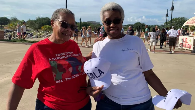Beverly and Delaine Frierson pose at Segra Park